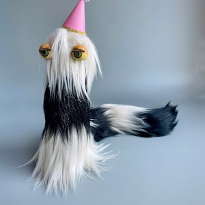 Surreal Sculpture, Furry Eyeball Slug, Pastel Art Toy, Surreal Bizarre Art, Doll Eye Art, Black And White Furry Creature