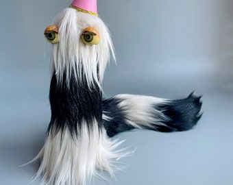 Surreal Sculpture, Furry Eyeball Slug, Pastel Art Toy, Surreal Bizarre Art, Doll Eye Art, Black And White Furry Creature