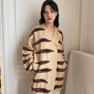 1970s Laura Biagiotti beige jacket, tiger stripes appliqués, open front, pockets
