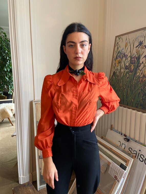1970s pumpkin orange blouse, dog ear collar, long