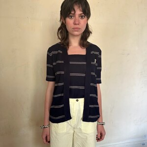 1970s Ted Lapidus twin set, navy and white striped knit top with wide straps and short sleeved cardigan without closures / xs - small
