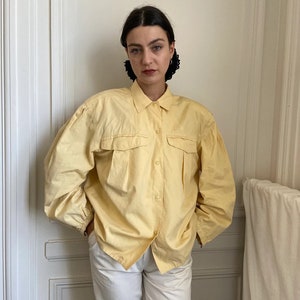 early 1980s Claude Montana oversized shirt, pale yellow gabardine, huge chest pockets, metal zippers at cuffs