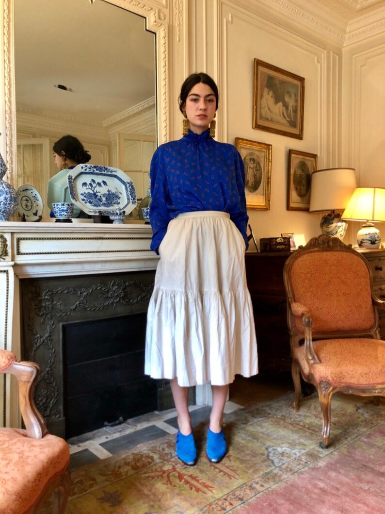 medium wide sleeves buttoned back small high collar 1970s Lanvin cobalt blue silk paisley print blouse