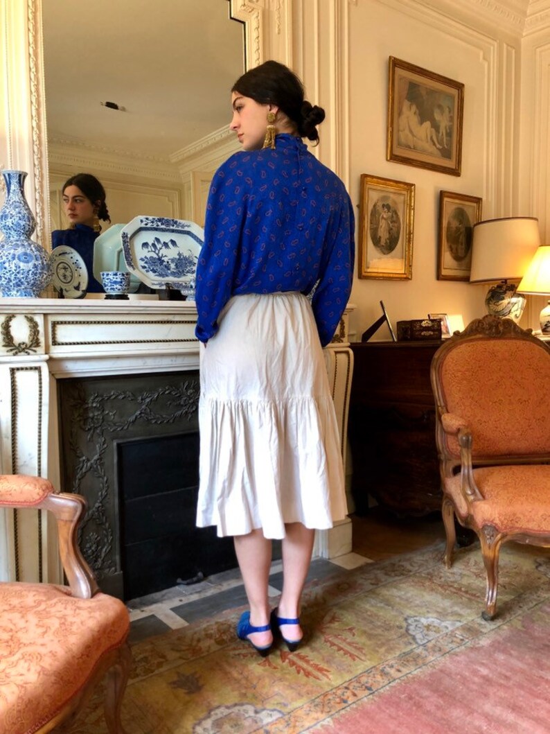 medium wide sleeves buttoned back small high collar 1970s Lanvin cobalt blue silk paisley print blouse