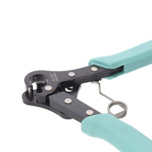 May include: Close-up of a pair of teal and black pliers. The handles are teal, and the jaws are black with silver rivets. The text "PATENT PENDING" is visible on the pliers. A silver spring connects the handles.