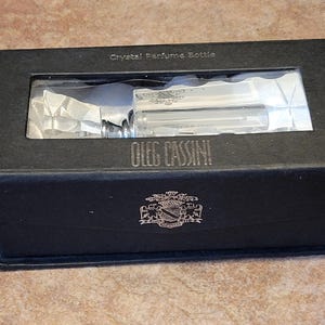 Oleg Casinni Chrystal Perfume Bottle, NIB, Box Slightly Worn on Bottom, Satin Liner, Elegant Design, Nicely Weighted, Designed for Jackie O