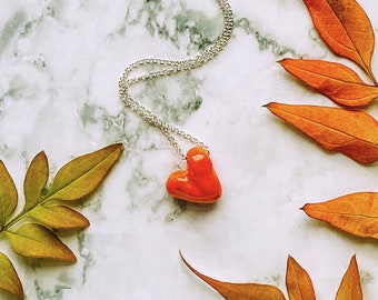 Red heart ceramic pendant on sterling silver 18'' chain necklace. Handcrafted porcelain jewellery. Double sided easy to wear pendant.