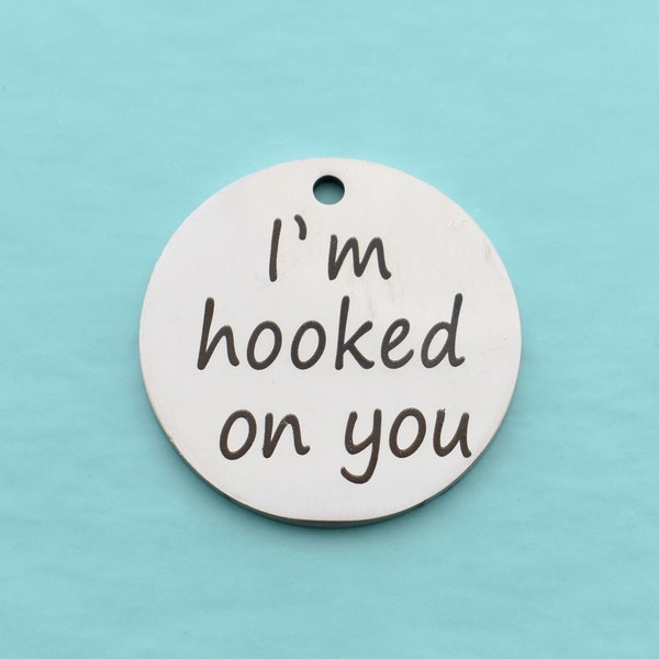 I'm hooked on you.  Stainless Steel word charm. Word Charms.  Stainless Steel Word Charms. Bracelet Charms
