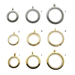 May include: Three sizes of silver and gold locket pendants with clear glass inserts and crystal accents. The lockets are shown in three rows, with the smallest lockets in the top row and the largest lockets in the bottom row.