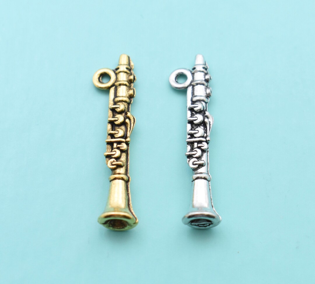 Charm in Gold or Silver Plated Pewter. Charm