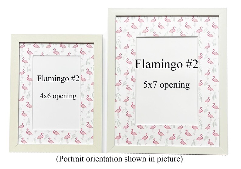 May include: Two white picture frames with a flamingo pattern border. The frames have openings for 4x6 and 5x7 inch photos. Text on the frames reads "Flamingo #2" and "Portrait orientation shown in picture".