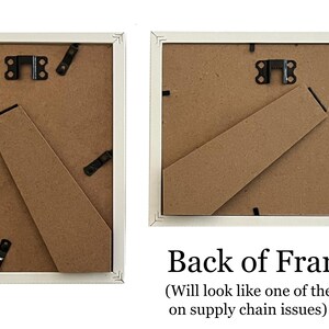 May include: Two rectangular picture frames with the backs visible. The backs are brown with black hardware and a cardboard easel. The text "Back of Frames" is visible.