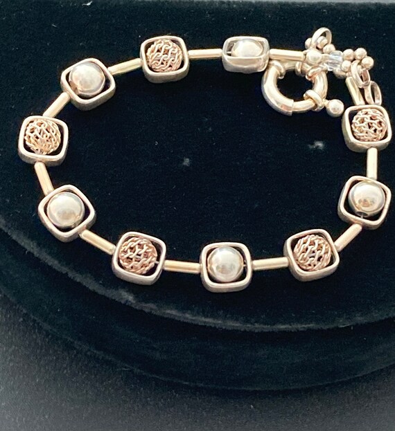 Fun Sterling silver bracelet with squares holding 