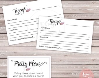 May include: White recipe cards with lines for ingredients and directions, and the word "Recipe" in script. A smaller card reads "Pretty Please" with text inviting guests to share a recipe with the bride-to-be. Watercolor hearts accent the text.