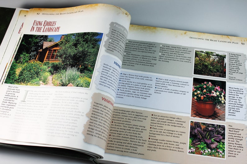 May include: A book page with the title "Using Edibles in the Landscape" and images of different edible plants, including herbs, fruits, and vegetables. The text describes how to incorporate edible plants into a landscape design.