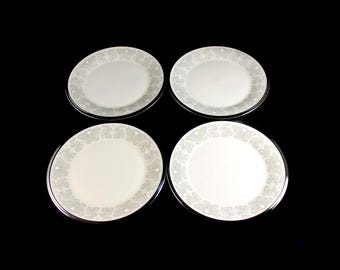 Platos para pan Lenox Snow Lily, porcelana color crema, juego de 4