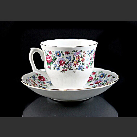 Footed Teacup and Saucer, Staffordshire, Springtime, England, Bone China, Floral Pattern, 22 Kt. Gold Trim