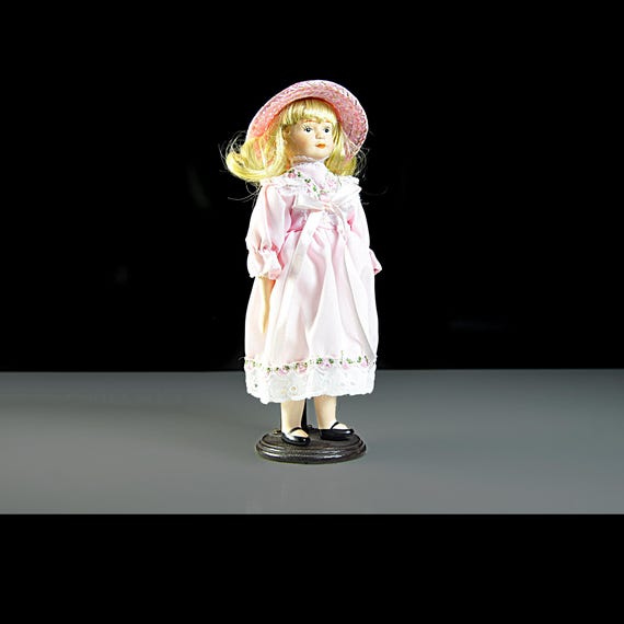 Porcelain Doll in Pink Dress with Bonnet and Stand – Unmarked Display Doll - 9-Inch