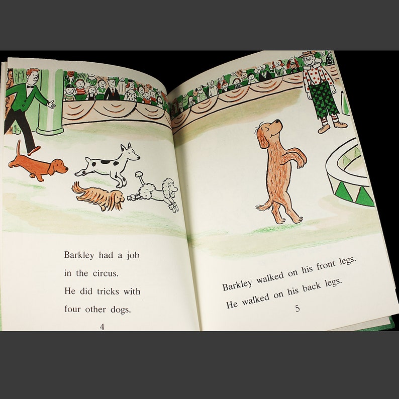 May include: A brown and white dog stands on its hind legs in a circus ring. The dog is performing tricks with four other dogs. The text "Barkley had a job in the circus. He did tricks with four other dogs. 4" is visible in the image.