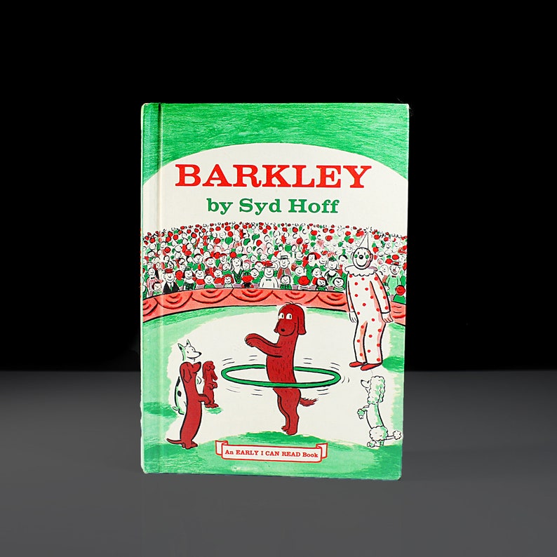May include: A green book cover with the title "BARKLEY by Syd Hoff" and a red dog jumping through a hoop. The book is part of the "I Can Read Book" series.