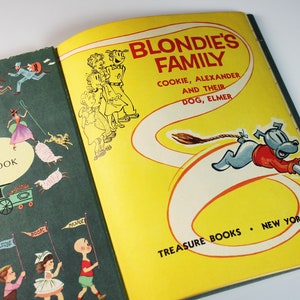May include: A green and yellow book with the title "This is my TREASURE BOOK" on the front cover. The back cover features a cartoon illustration of Blondie's family, including Cookie, Alexander, and their dog, Elmer. The text on the back cover reads "BLONDIE'S FAMILY COOKIE, ALEXANDER AND THEIR DOG, ELMER TREASURE BOOKS NEW YORK."