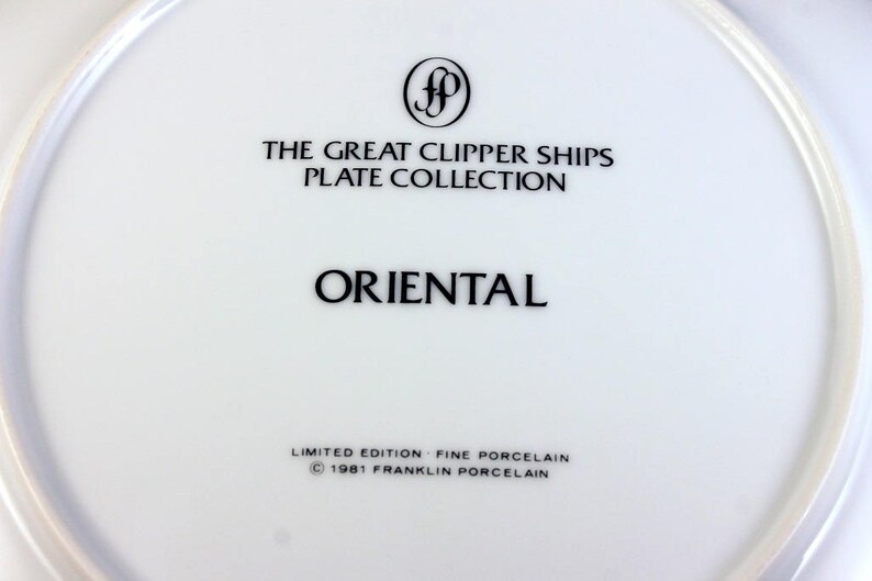 May include: White porcelain plate from "The Great Clipper Ships Plate Collection" with the word "ORIENTAL" in black. The plate also features the Franklin Porcelain logo and text indicating it's a limited edition from 1981.