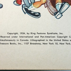 May include: Copyright information for a book published in 1954 by King Features Syndicate, Inc. The book was published simultaneously in Canada and lithographed in the United States of America. The publisher is Treasure Books, Inc., located at 1107 Broadway, New York 10, New York.