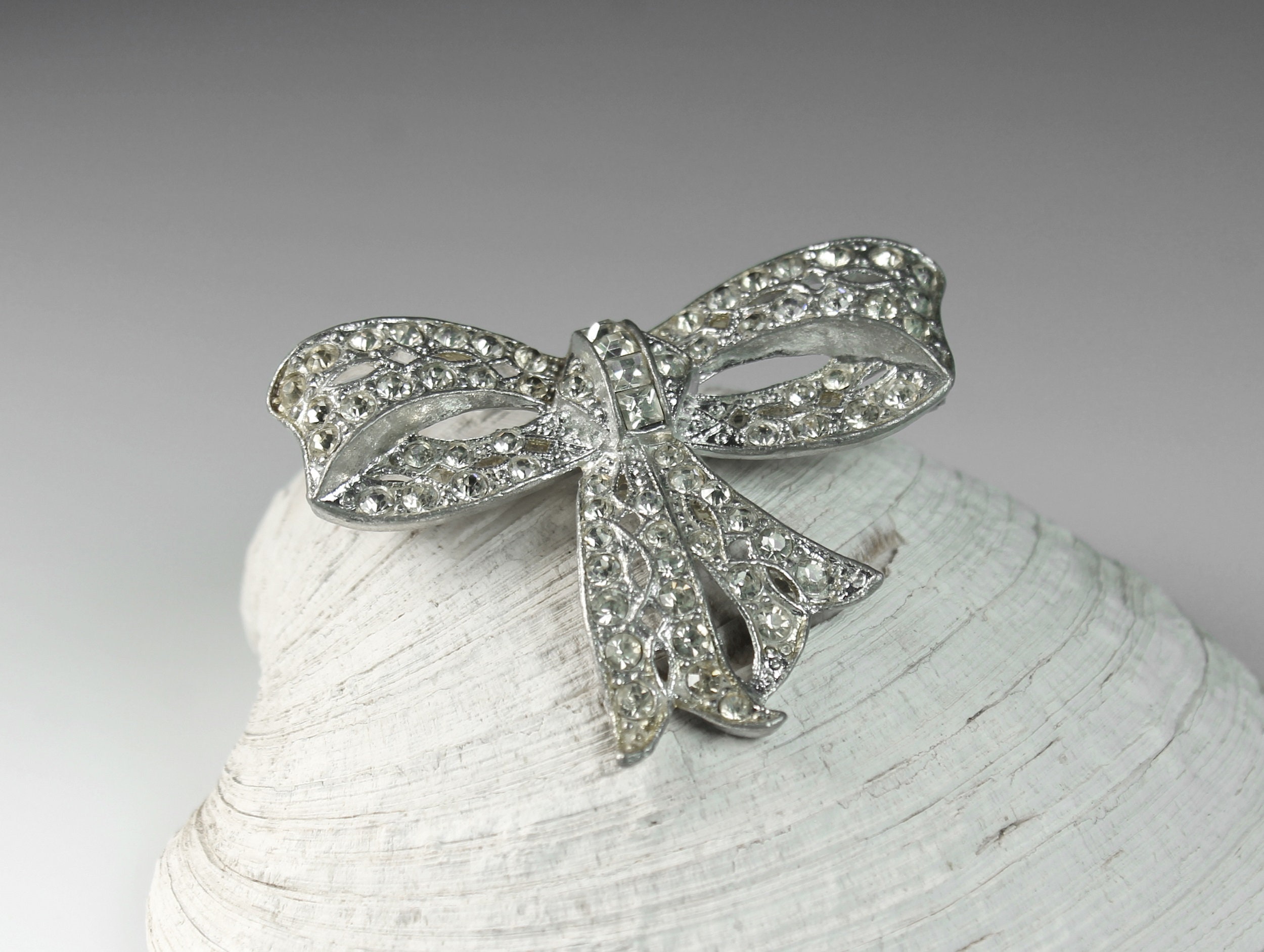Vintage Clear Rhinestone Bow Brooch Pin on Silver Setting – Second