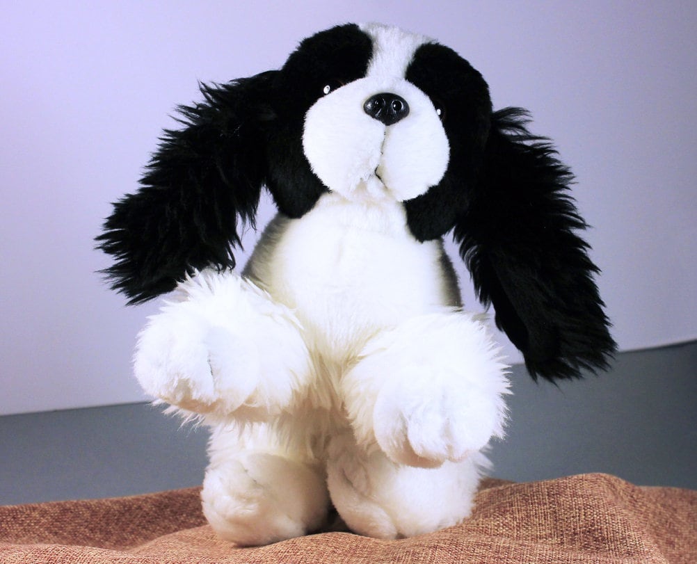 black and white stuffed dog toy