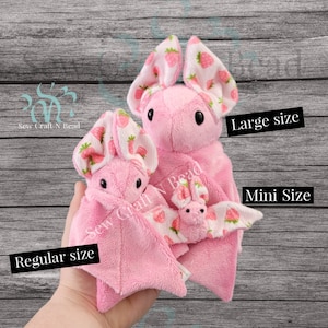 Peluche de murciélago fresa rosa