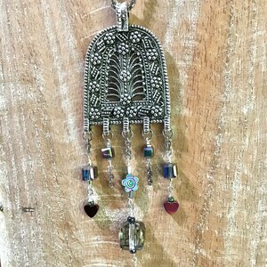 Zola pendant with added beads and metal chain