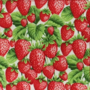 May include: A white background with a repeating pattern of red strawberries and green leaves.