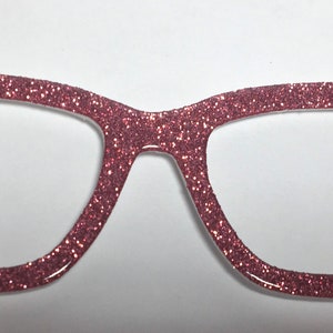 May include: Pink glitter glasses with a classic rectangular frame.