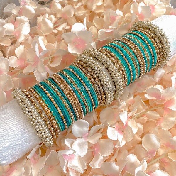 Thanjina Teal Bangle stack