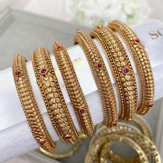 Set bangles in gold new arrivals