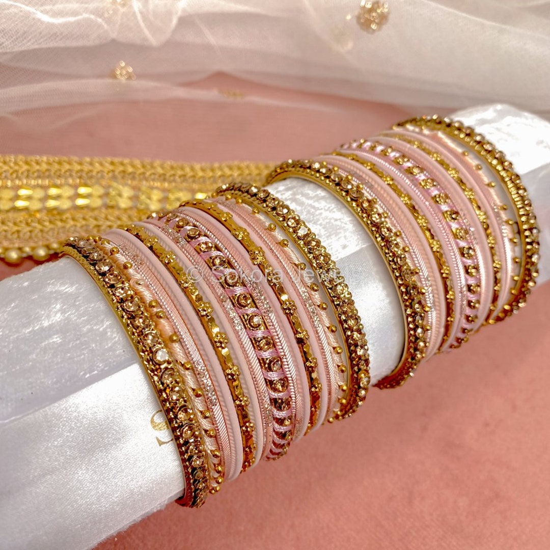 Pink and gold bangles deals