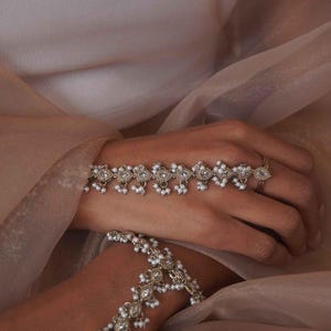 Rekha Pearl Drop Hand Harness Wedding Hand Accessories Indian Jewelry Bride Pakistani Jewelry Gold Hathphool Ring Bracelet Sokora Jewels