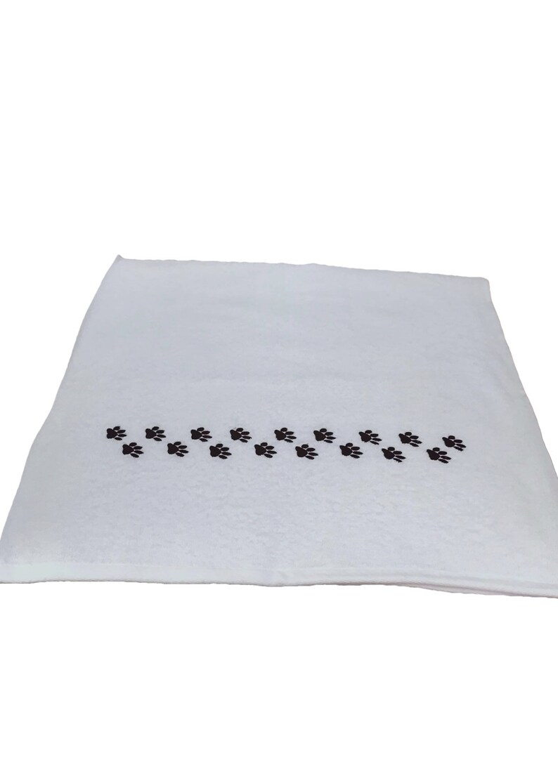 A pair of Paw prints hand towels dog animal novelty towels Etsy