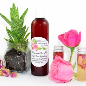 JBHomemade’s 8 oz Radiant Rose Glow: rose-infused aloe vera paired with an aloe plant. Glass jar filled with aloe and pink rose petals.