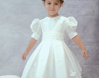 T-length Flower Girl dress classic, ivory silk with beige silk sash and big bow. Very Puffy sleeves. Under Petticoat,girl wedding dress