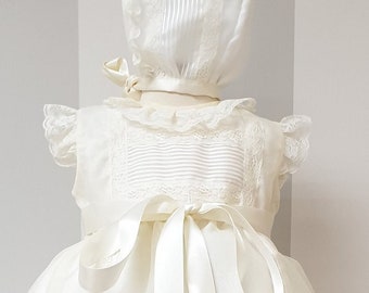 Baby Baptism gown made in ivory organza and lace. Matching bonnet included. Classic baby christening dress made in Spain with matching hat