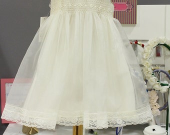 Baptism dress for baby girl made from ivory organza, ivory laces, hand smocked dress. Special ocassion like Christening, weddings, birthday
