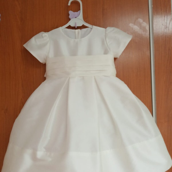 T-length Flower Girl dress classic, ivory silk with ivory silk sash and big bow. Puffy straight sleeves. Under Petticoat,girl wedding dress