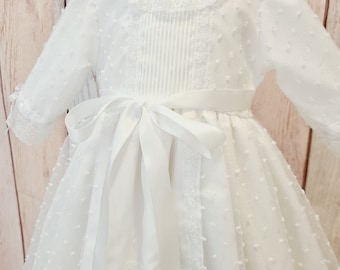 Baby Baptism gown made in white dotted organza and lace. Matching bonnet included. Classic baby christening dress made in Spain.