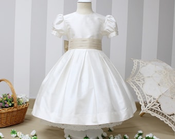 T-length Flower Girl dress classic, ivory silk with beige silk sash and big bow. Very Puffy sleeves. Under Petticoat,girl wedding dress