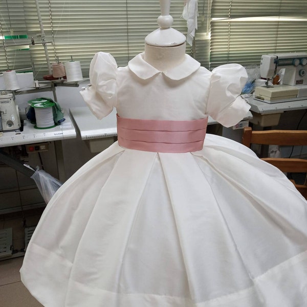 T-length Flower Girl dress classic, ivory silk with silk sash and big bow. Puffy sleeves, peter pan collar. Girl elegant wedding dress