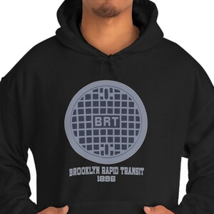 Brooklyn Rapid Transit Manhole Cover Unisex Heavy Blend Hoodie