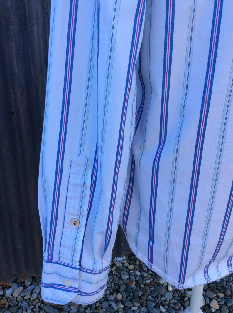Vintage Tommy Hilfiger striped shirt in a size Medium