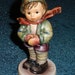 schmelinga reviewed It's Cold Goebel Hummel Figurine #421 Exclusive Special Edition 1984 - Mint Condition Wintertime Collectible Great Gift!