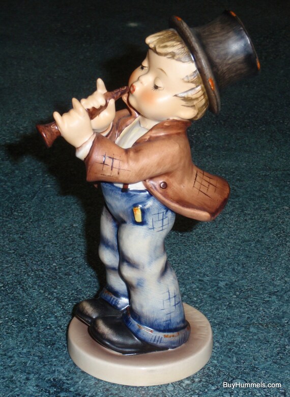 hummel boy playing flute